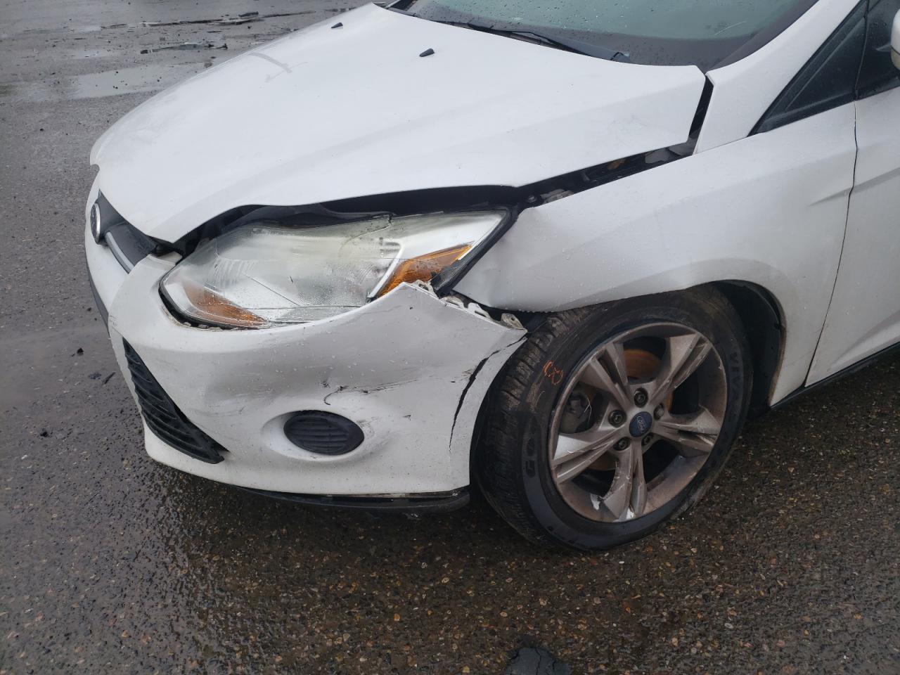 Photo 9 from auction – 2013 FORD FOCUS SE with VIN 1FADP3F26DL253244