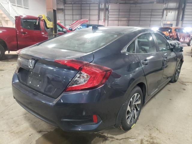 Photo 4 from auction – 2018 HONDA CIVIC EX with VIN 19XFC2F73JE001766
