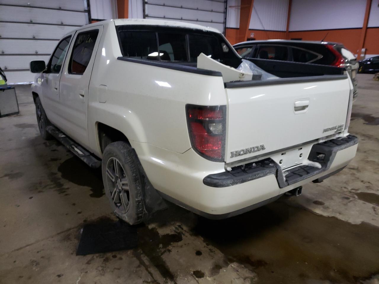 Photo 3 from auction – 2012 HONDA RIDGELINE with VIN 5FPYK1F73CB551656