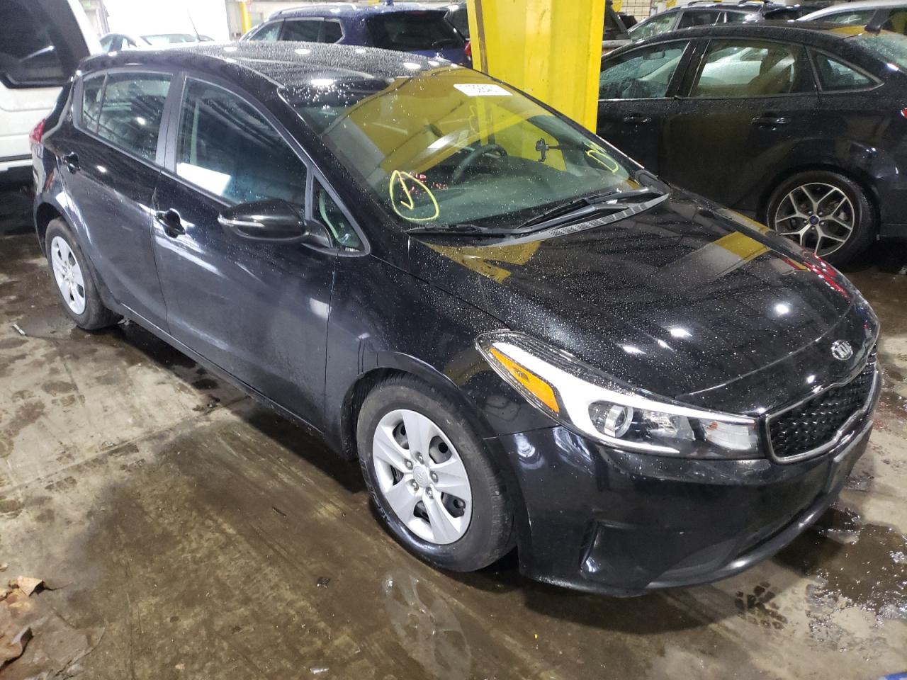 KIA FORTE LX 2018 with VIN KNAFK5A85J5772792 - Photo from auction