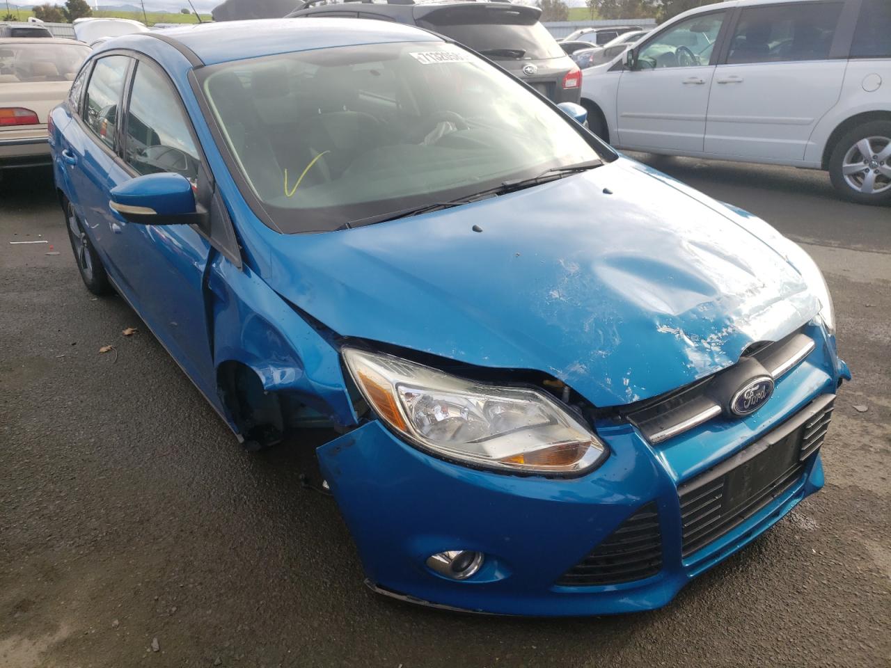 FORD FOCUS SE 2014 with VIN 1FADP3F21EL170208 - Photo from auction