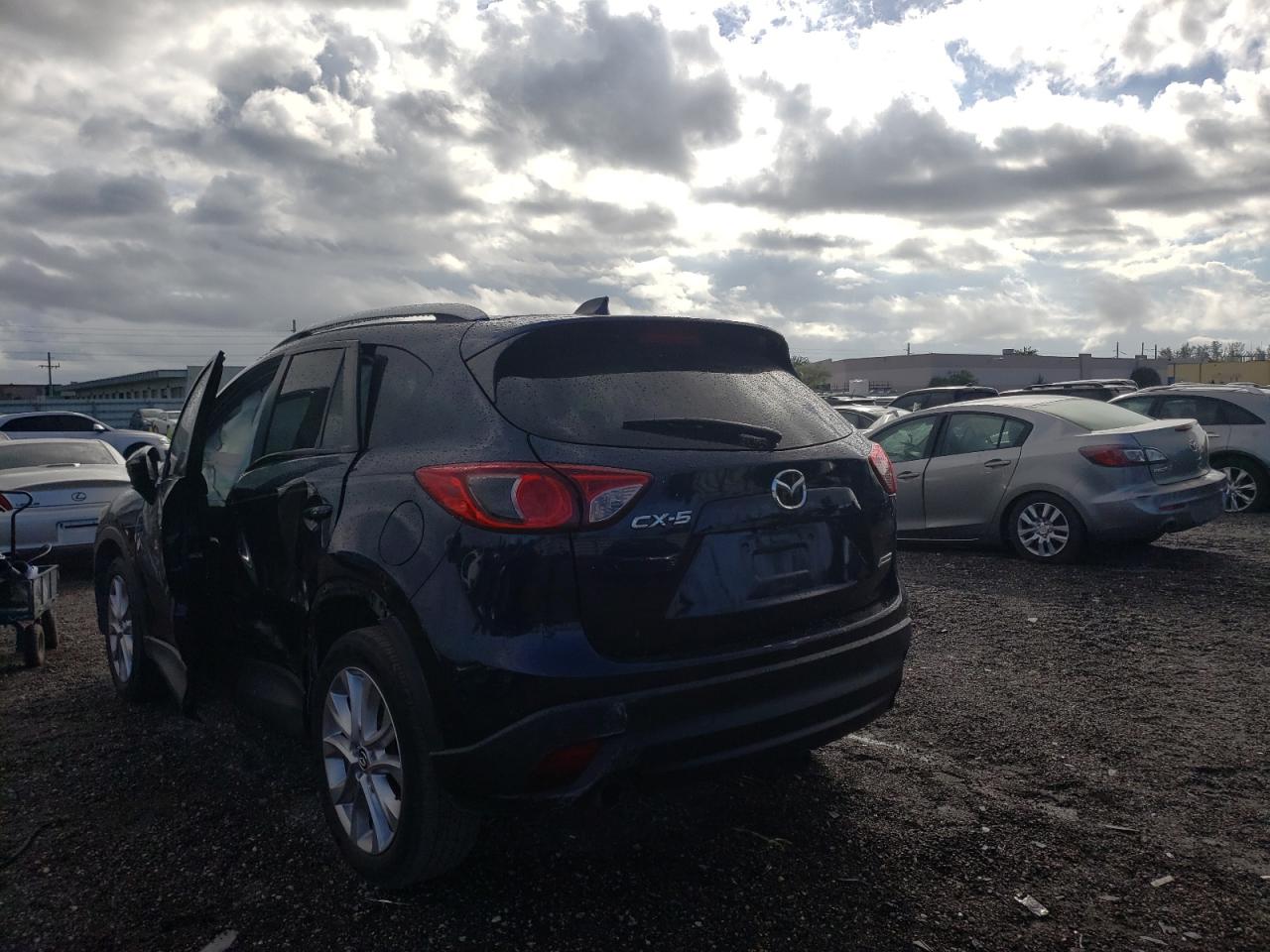 Photo 3 from auction – 2015 MAZDA CX-5 GT with VIN JM3KE2DY0F0492020