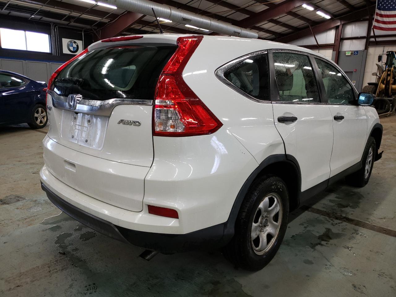 Photo 4 from auction – 2015 HONDA CR-V LX with VIN 5J6RM4H33FL117980
