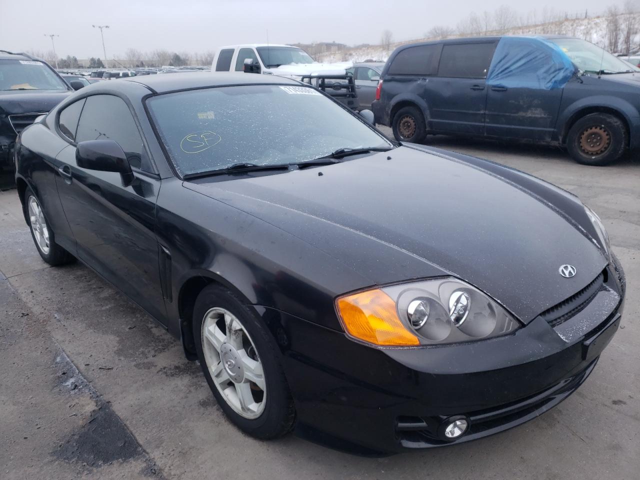 Photo 1 from auction – 2003 HYUNDAI TIBURON with VIN KMHHM65D33U054083