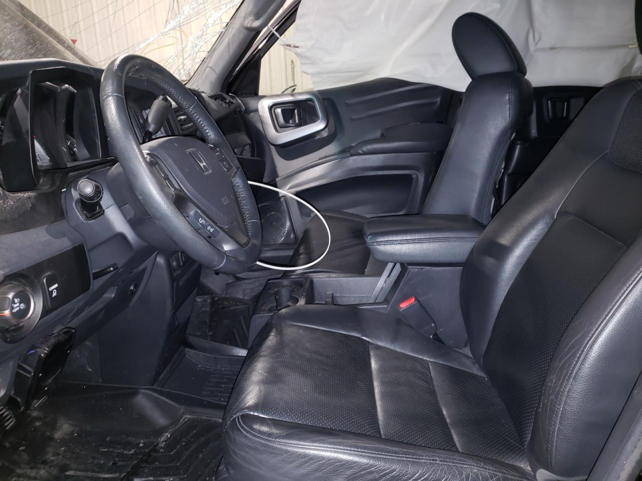 Photo 5 from auction – 2013 HONDA RIDGELINE with VIN 5FPYK1F59DB502963