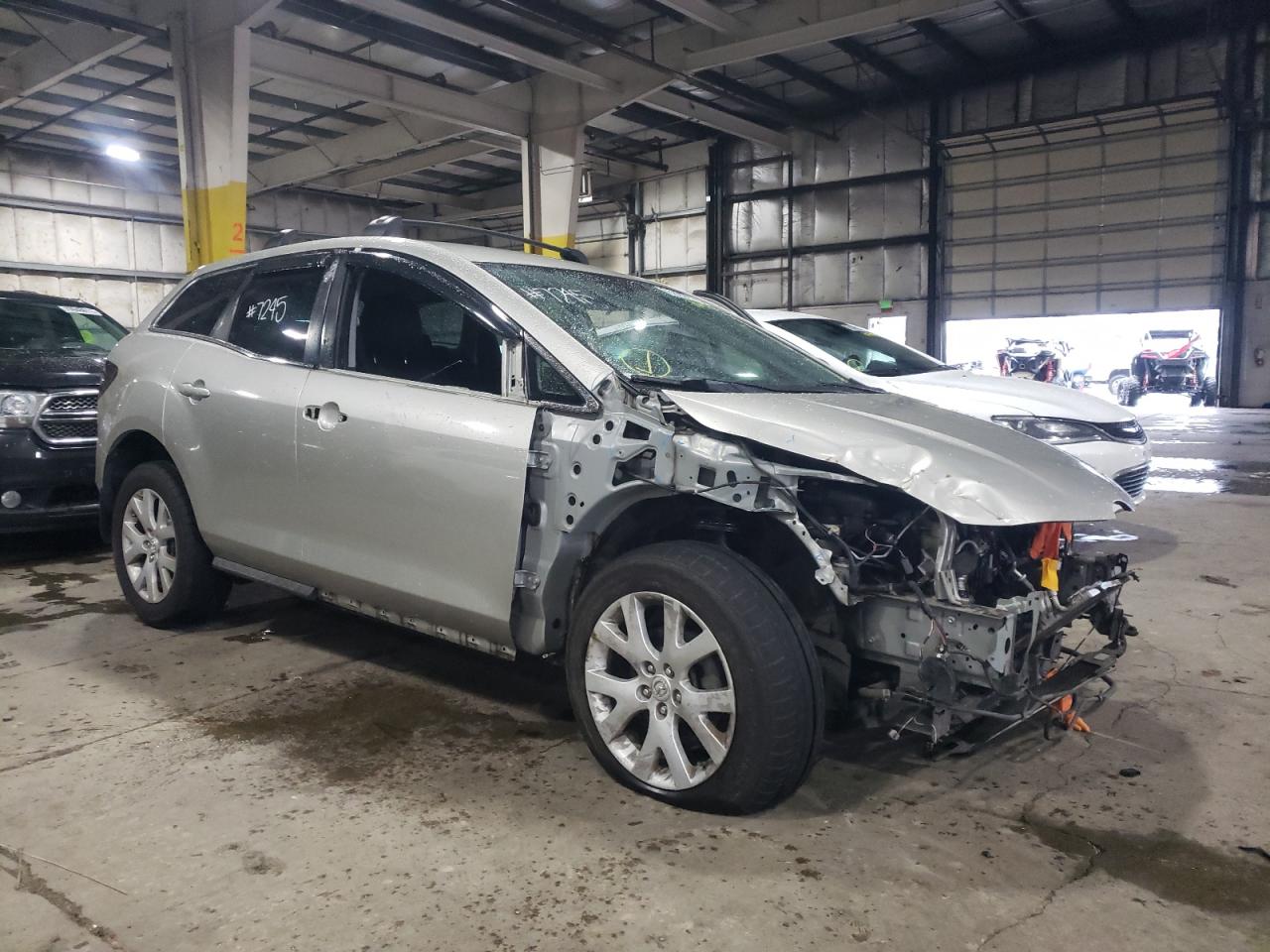 MAZDA CX-7 2009 with VIN JM3ER29L490229600 - Photo from auction