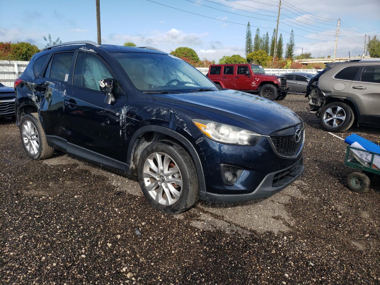 Photo 9 from auction – 2015 MAZDA CX-5 GT with VIN JM3KE2DY0F0492020