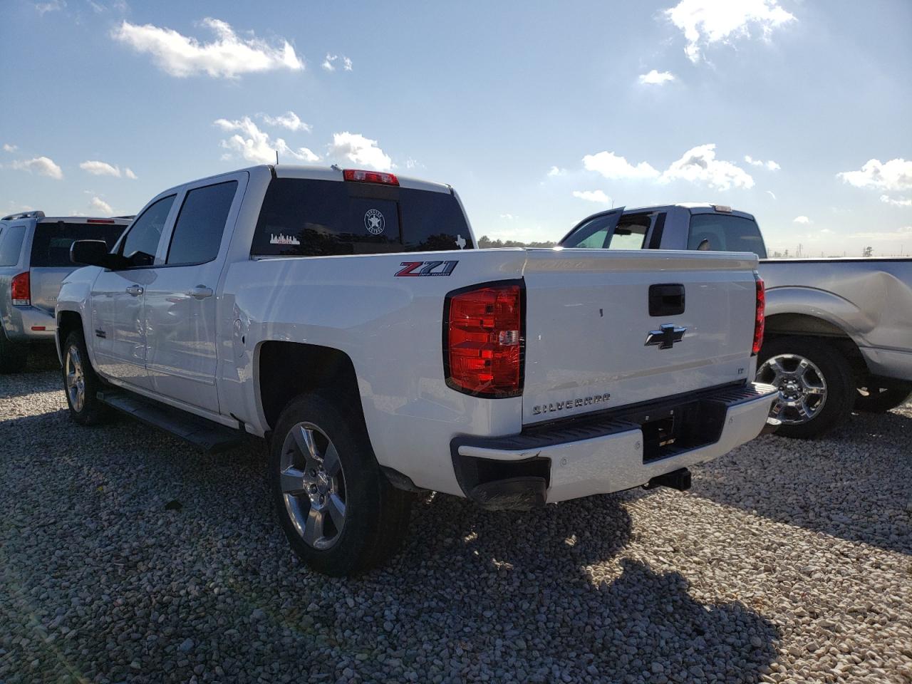 Photo 3 from auction – 2018 CHEVROLET SILVERADO with VIN 3GCUKREC8JG604735