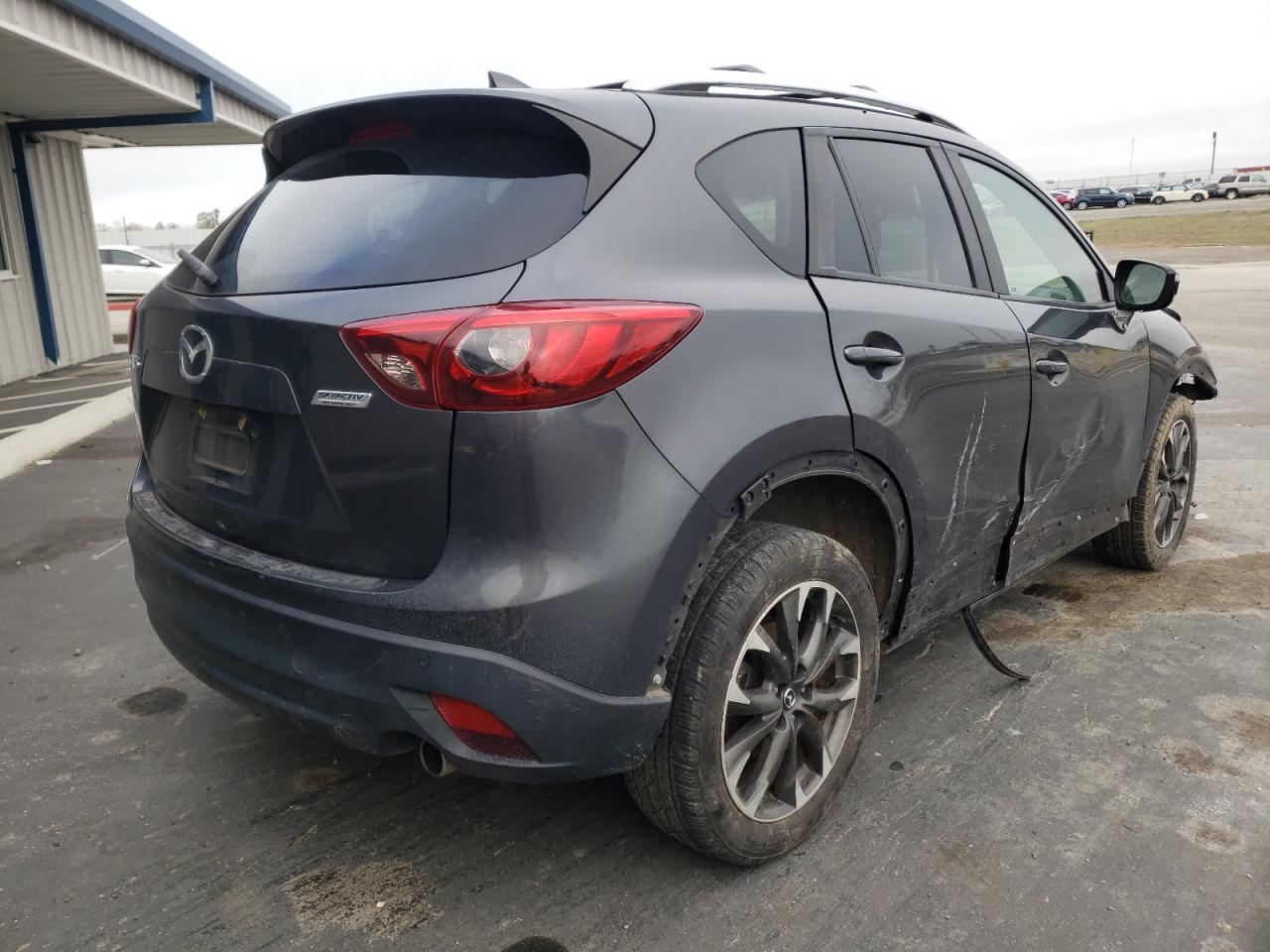 Photo 4 from auction – 2016 MAZDA CX-5 GT with VIN JM3KE2DYXG0639462