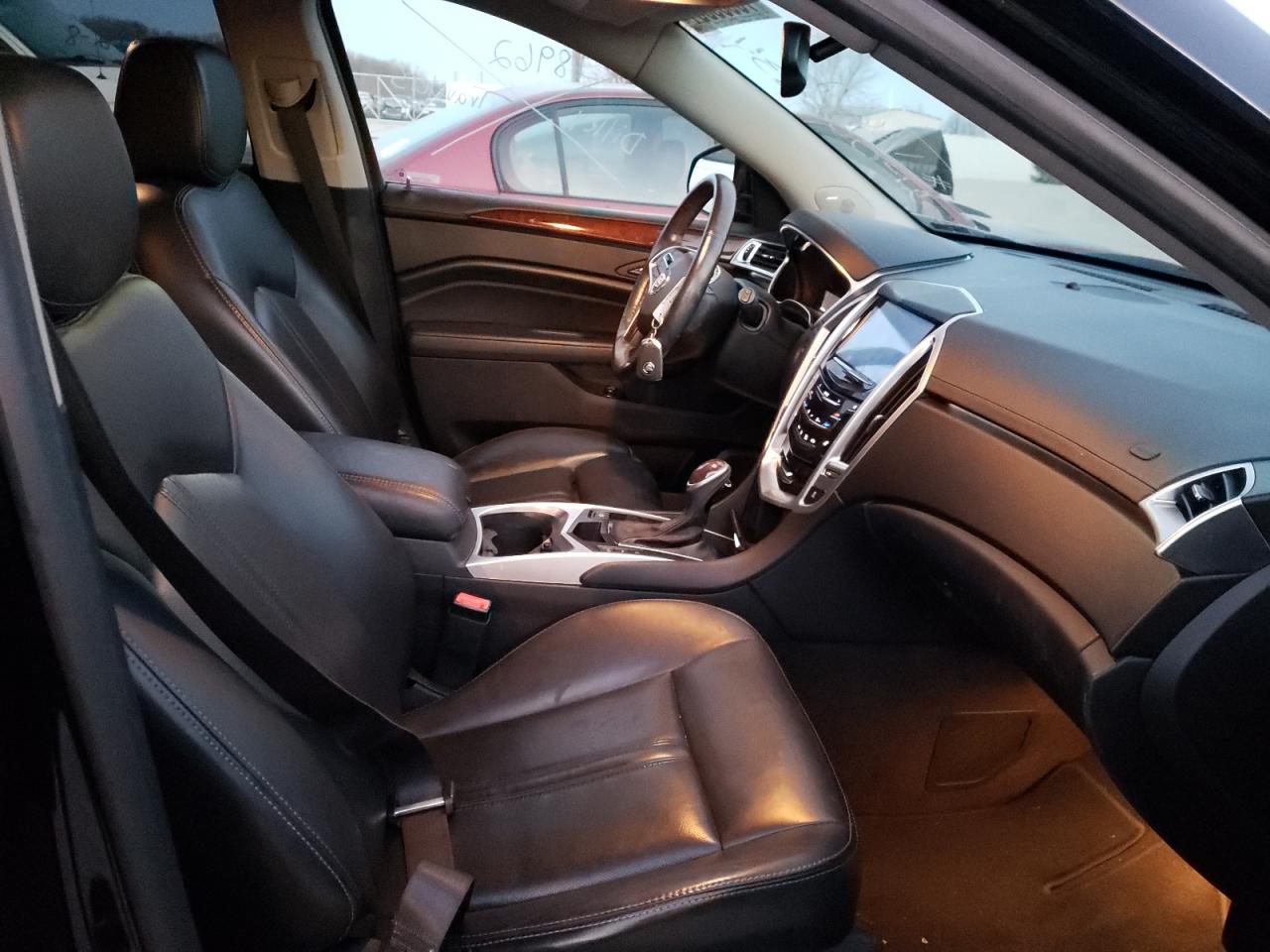 Photo 5 from auction – 2016 CADILLAC SRX LUXURY with VIN 3GYFNEE32GS561910