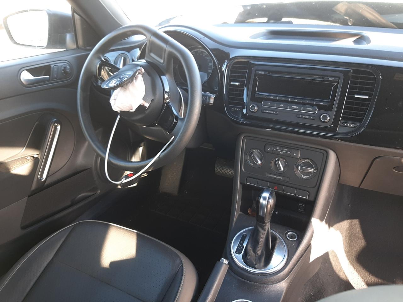 Photo 9 from auction – 2015 VOLKSWAGEN BEETLE 1.8 with VIN 3VWF17AT2FM639928