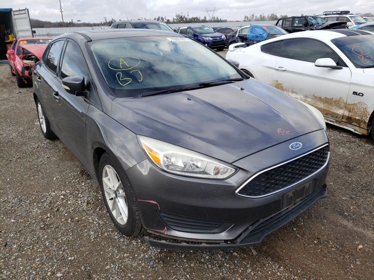 FORD FOCUS SE 2015 with VIN 1FADP3F2XFL270258 - Photo from auction