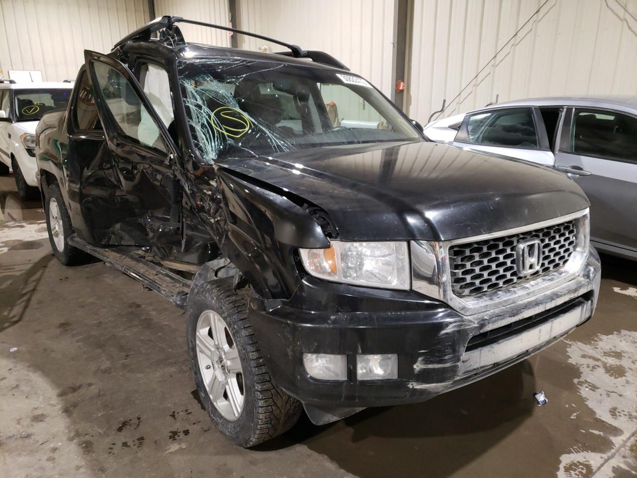 HONDA RIDGELINE 2013 with VIN 5FPYK1F59DB502963 - Photo from auction