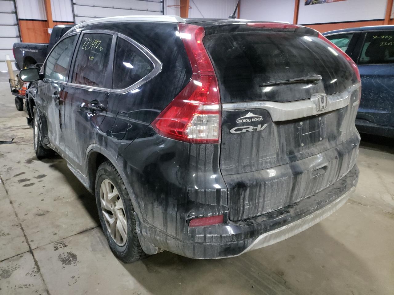 Photo 3 from auction – 2015 HONDA CR-V EX with VIN 2HKRM4H55FH122075