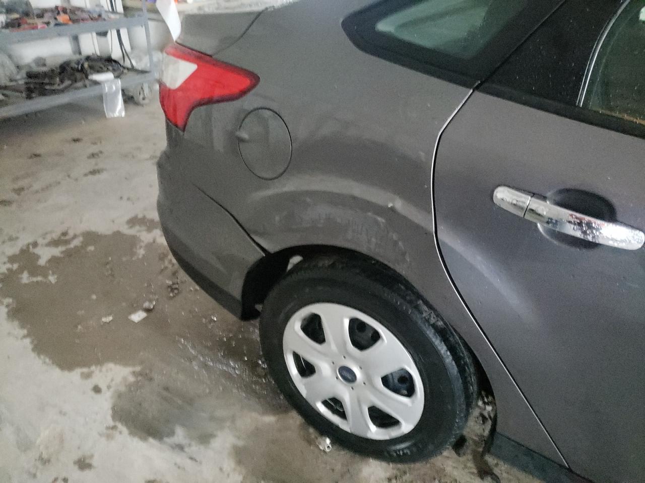 Photo 9 from auction – 2013 FORD FOCUS S with VIN 1FADP3E2XDL275569