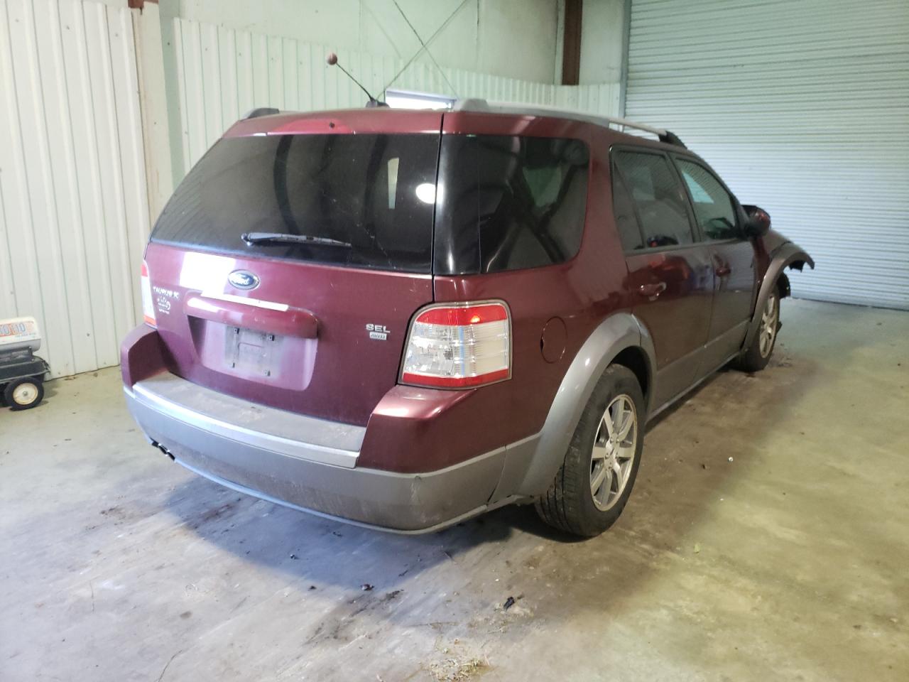 Photo 4 from auction – 2008 FORD TAURUS X S with VIN 1FMDK05W18GA32835
