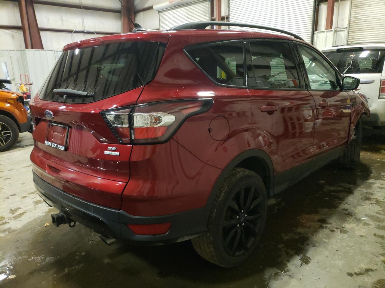 Photo 4 from auction – 2018 FORD ESCAPE SE with VIN 1FMCU0GD0JUC70281
