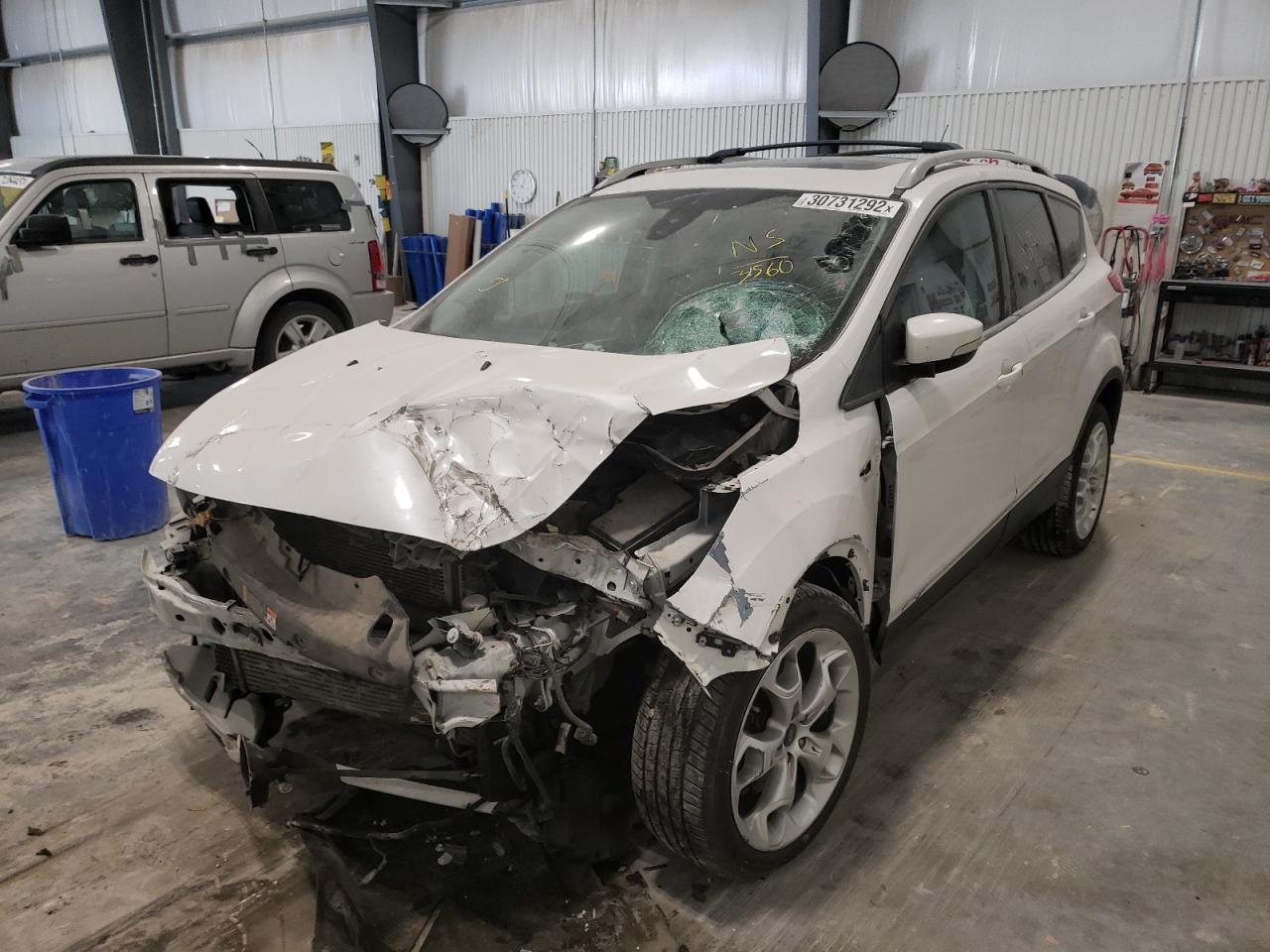 Photo 2 from auction – 2013 FORD ESCAPE TIT with VIN 1FMCU9J97DUA33560