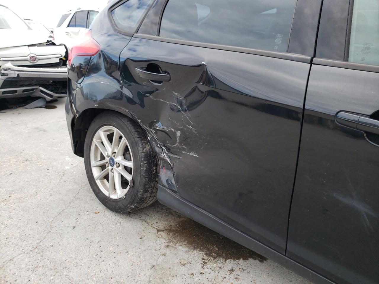 Photo 9 from auction – 2015 FORD FOCUS SE with VIN 1FADP3K21FL329560