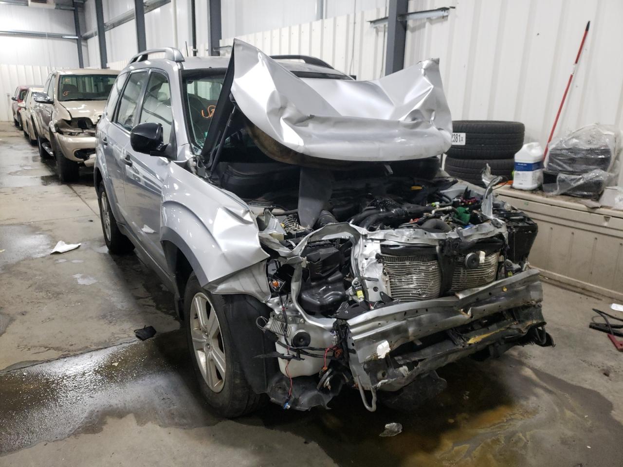 SUBARU FORESTER 2012 with VIN JF2SHBBCXCH433904 - Photo from auction