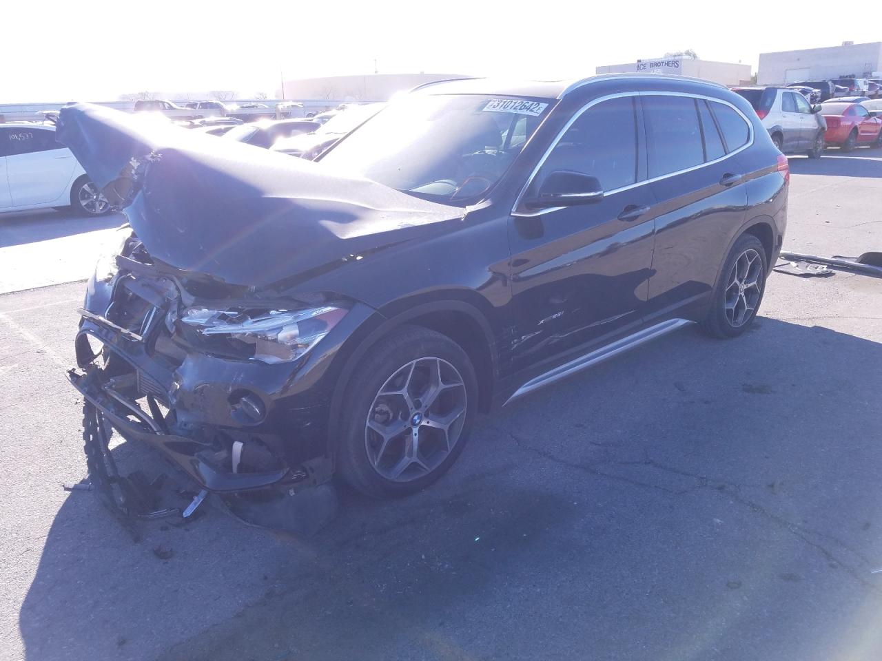 Photo 2 from auction – 2016 BMW X1 XDRIVE2 with VIN WBXHT3C32G5E50740