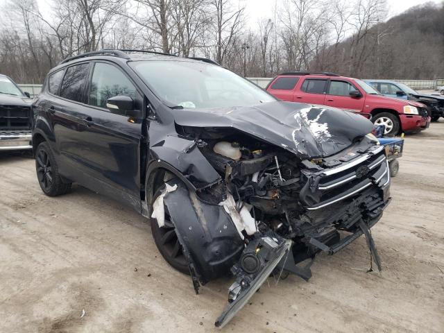 FORD ESCAPE TIT 2017 with VIN 1FMCU9J9XHUB23100 - Photo from auction
