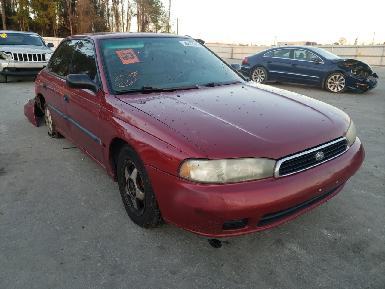 SUBARU LEGACY L 1997 with VIN 4S3BD4358V7206595 - Photo from auction