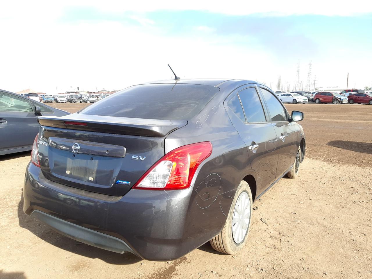 Photo 4 from auction – 2015 NISSAN VERSA S with VIN 3N1CN7AP9FL821910