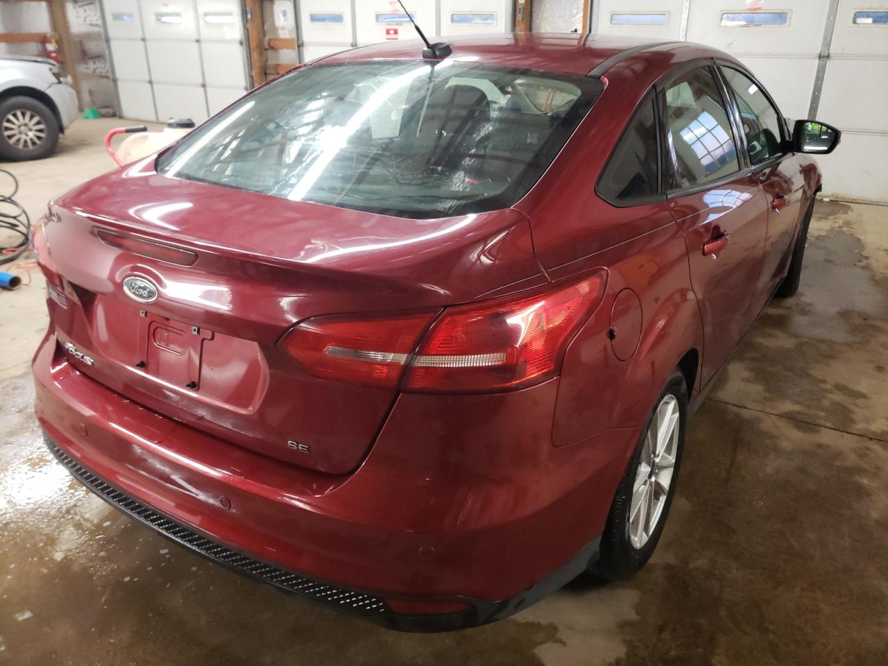 Photo 4 from auction – 2015 FORD FOCUS SE with VIN 1FADP3F2XFL213347