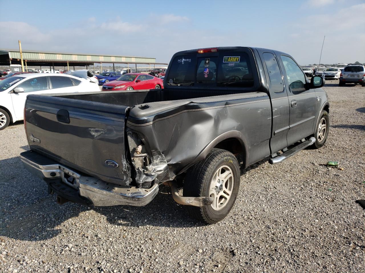 Photo 9 from auction – 2003 FORD F150 with VIN 1FTRX17W03NA24373