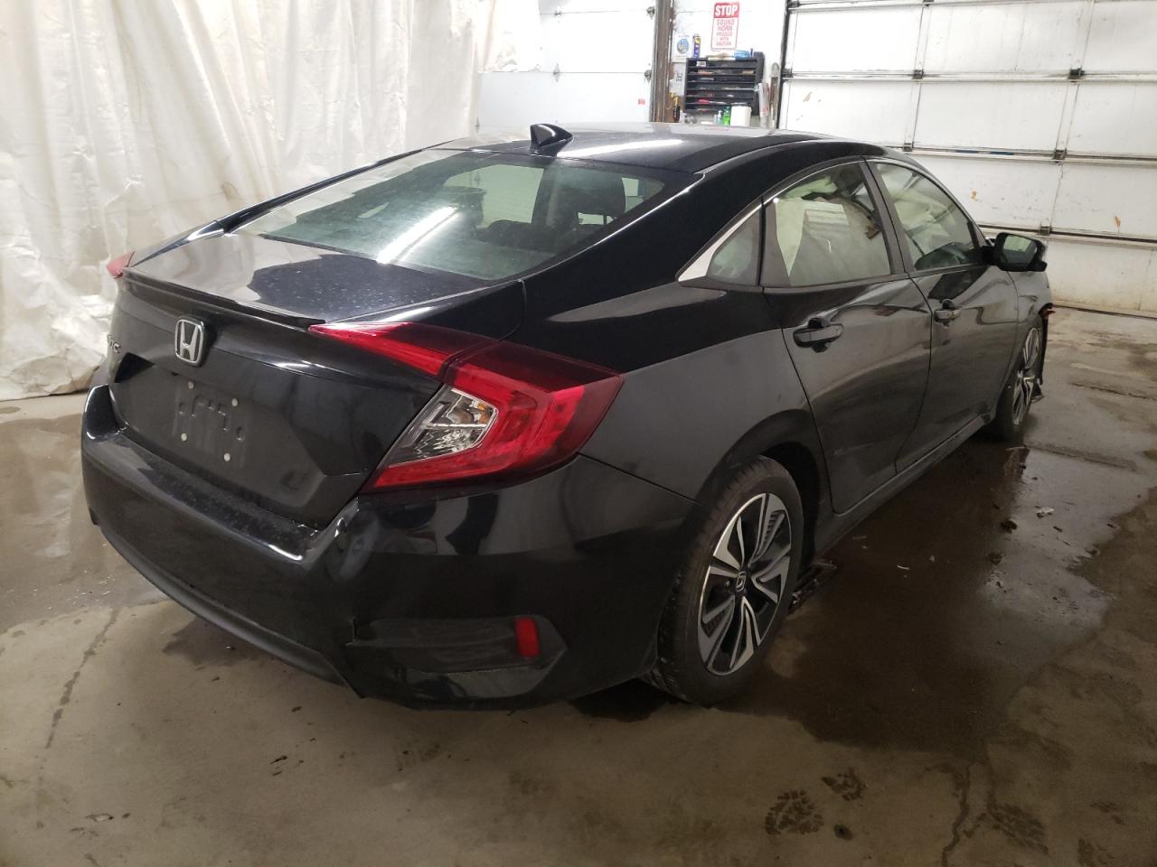 Photo 4 from auction – 2018 HONDA CIVIC EX with VIN JHMFC1F31JX024999
