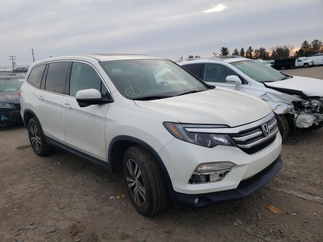 HONDA PILOT EXL 2018 with VIN 5FNYF6H50JB029926 - Photo from auction