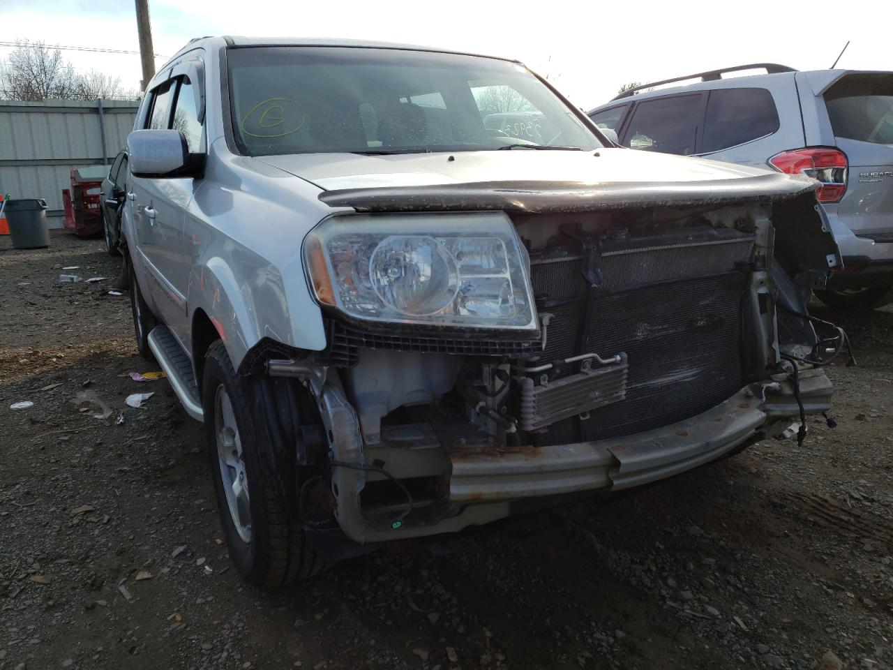 HONDA PILOT EXL 2010 with VIN 5FNYF4H56AB010737 - Photo from auction