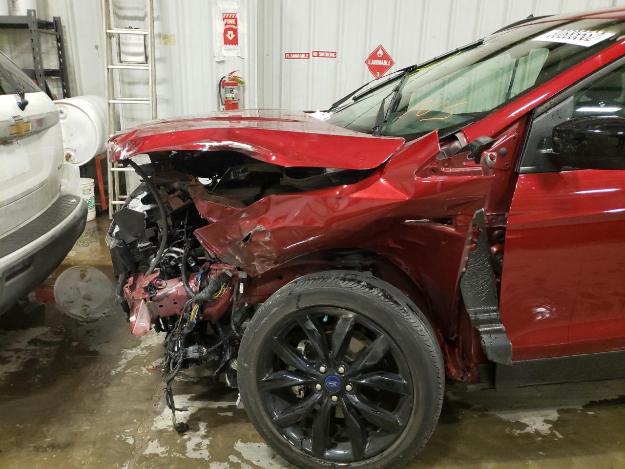 Photo 9 from auction – 2018 FORD ESCAPE SE with VIN 1FMCU0GD0JUC70281