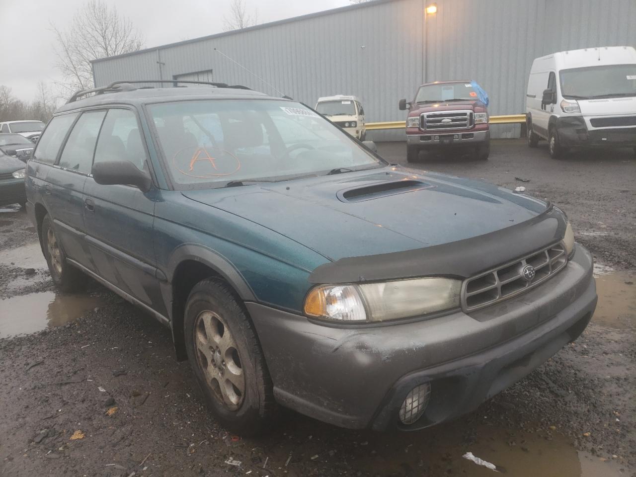 SUBARU LEGACY OUT 1999 with VIN 4S3BG6857X6604787 - Photo from auction