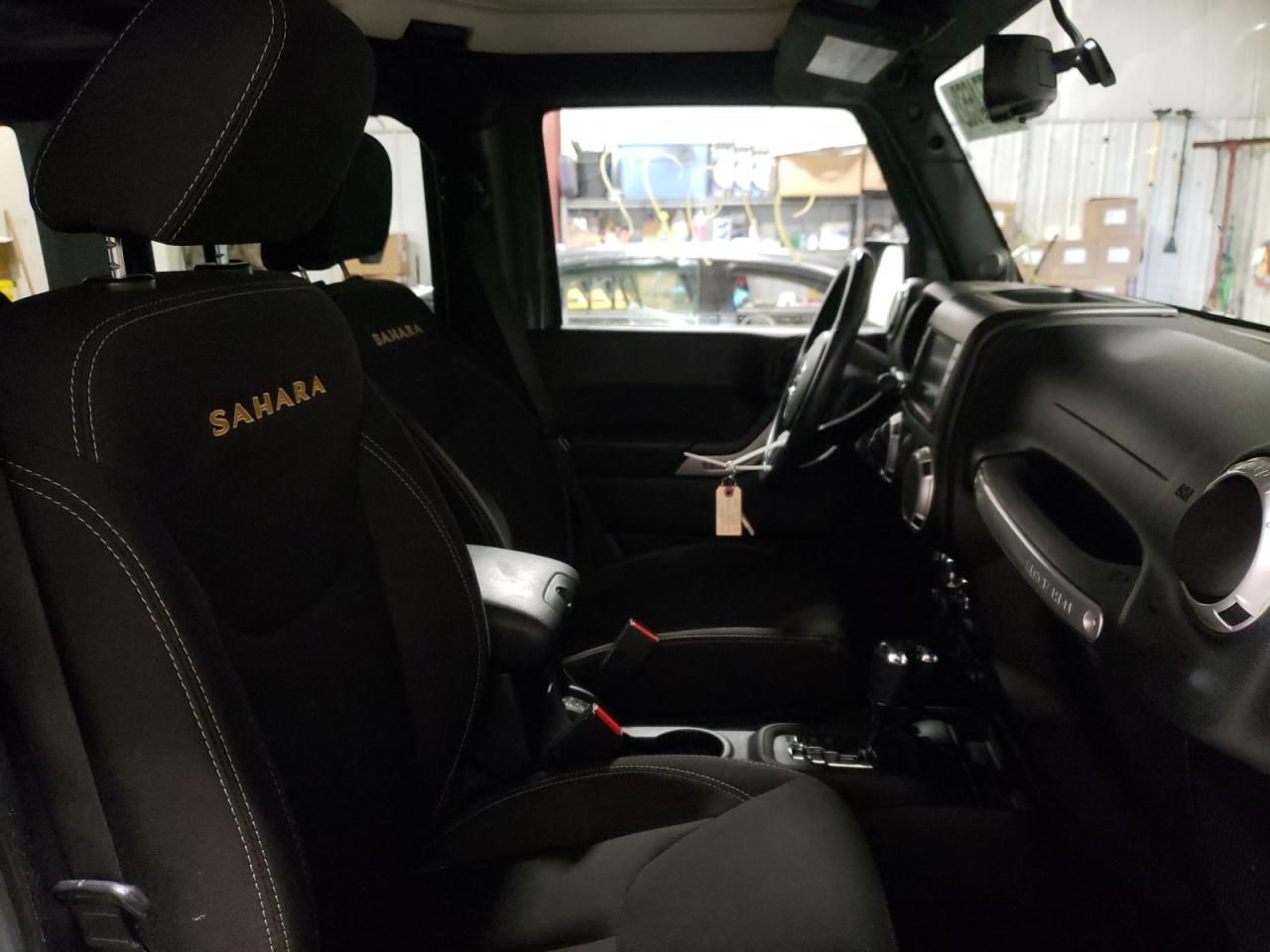 Photo 5 from auction – 2014 JEEP WRANGLER U with VIN 1C4BJWEG4EL135924