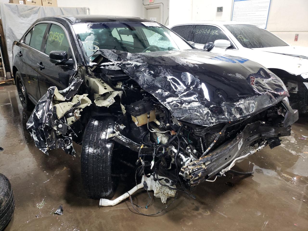 FORD TAURUS POL 2017 with VIN 1FAHP2MK2HG135317 - Photo from auction