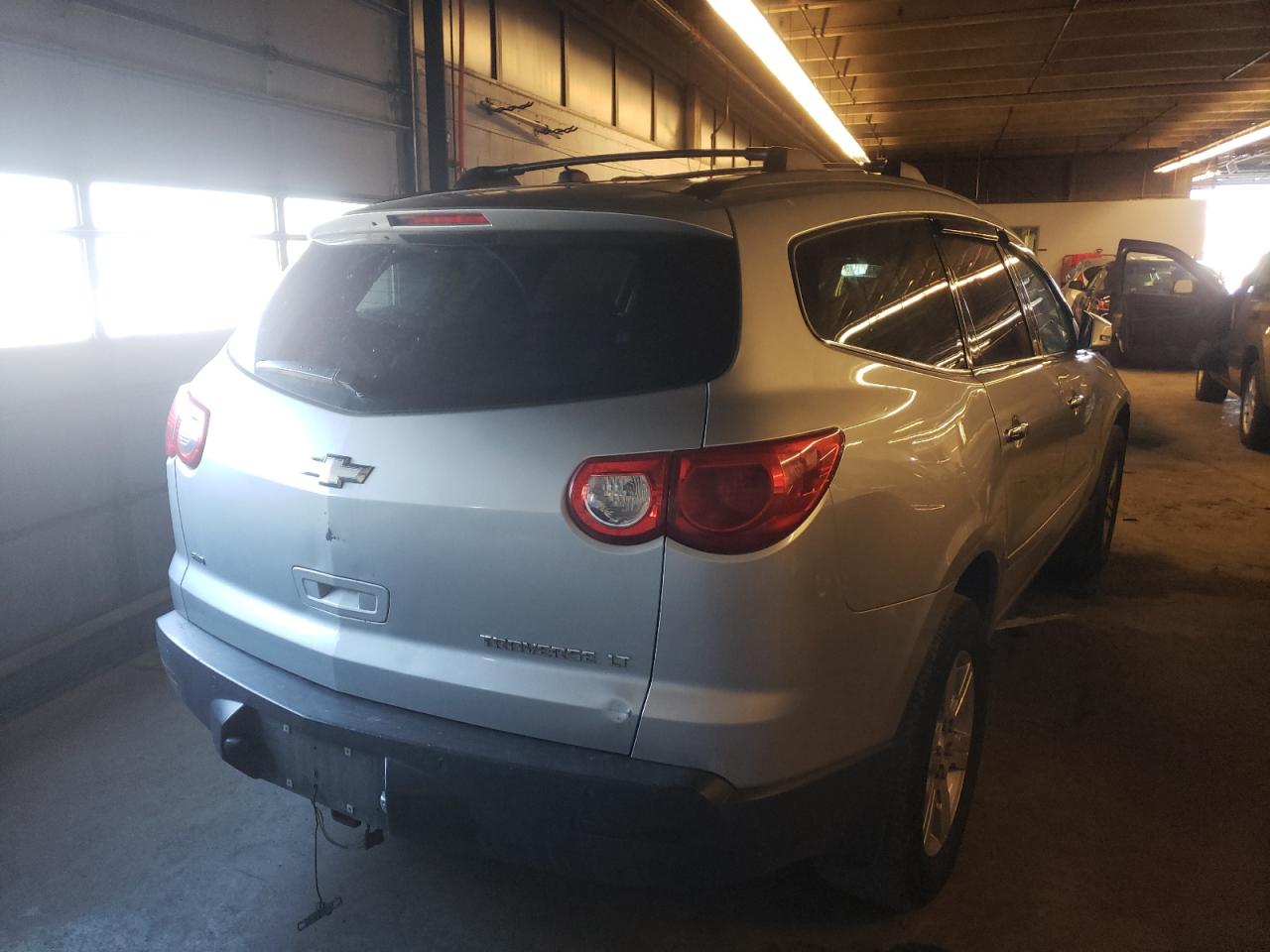 Photo 4 from auction – 2010 CHEVROLET TRAVERSE L with VIN 1GNLVFED6AJ269619