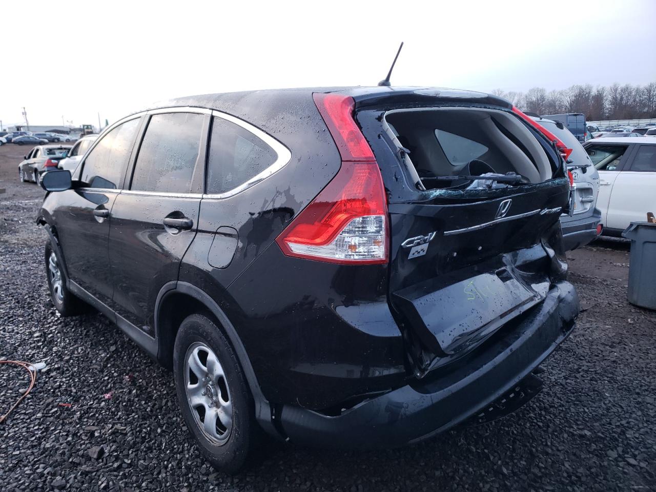 Photo 3 from auction – 2014 HONDA CR-V LX with VIN 2HKRM4H38EH710470