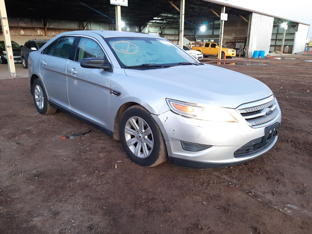 FORD TAURUS SE 2011 with VIN 1FAHP2DW3BG146658 - Photo from auction