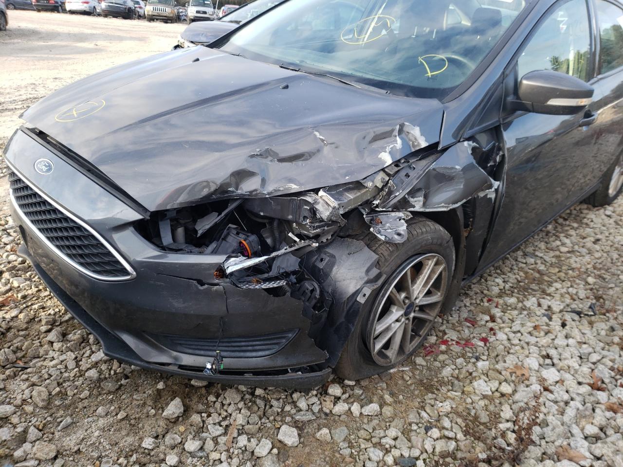 Photo 9 from auction – 2016 FORD FOCUS SE with VIN 1FADP3F24GL247852