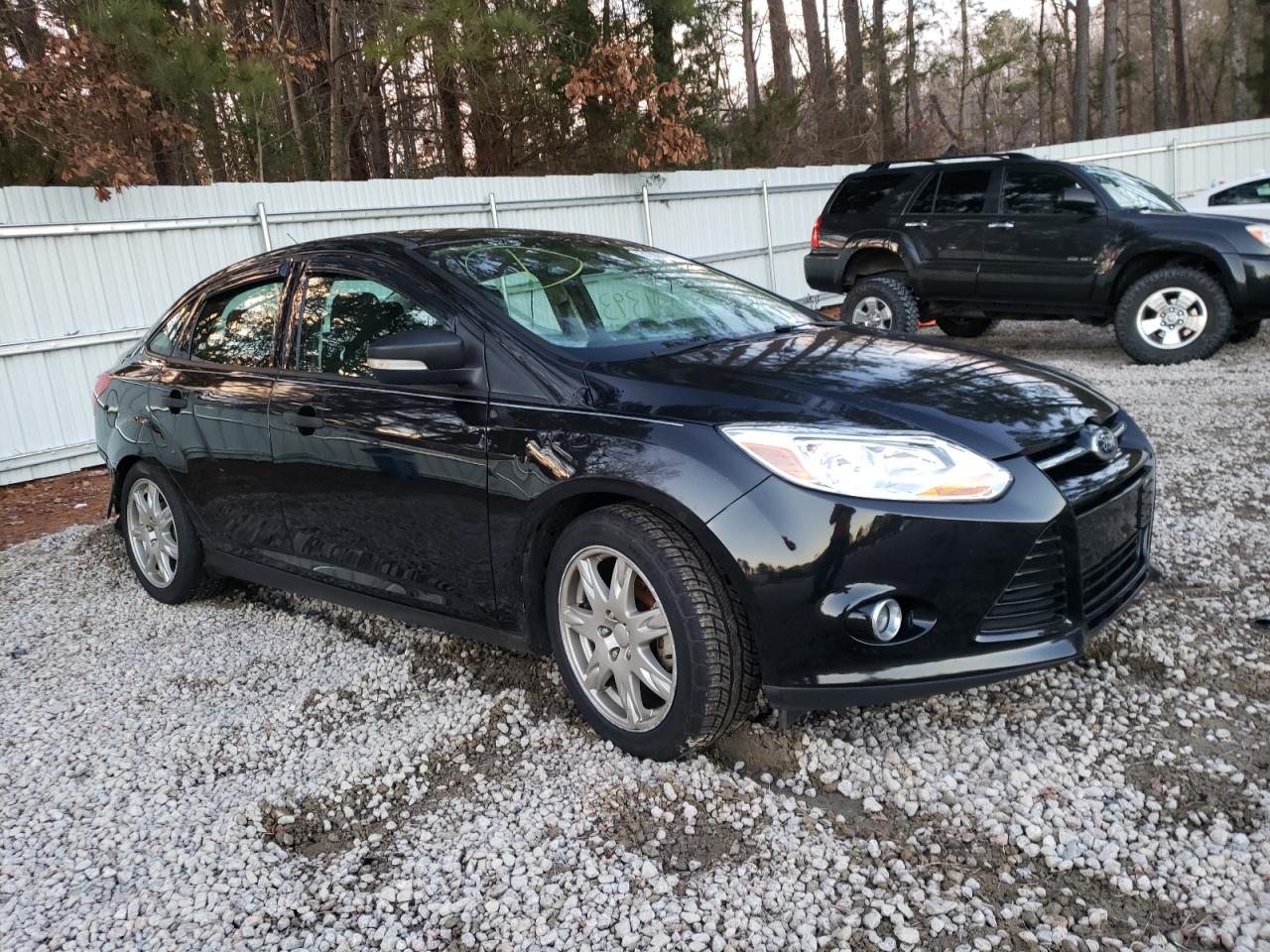 FORD FOCUS S 2013 with VIN 1FADP3E20DL188621 - Photo from auction