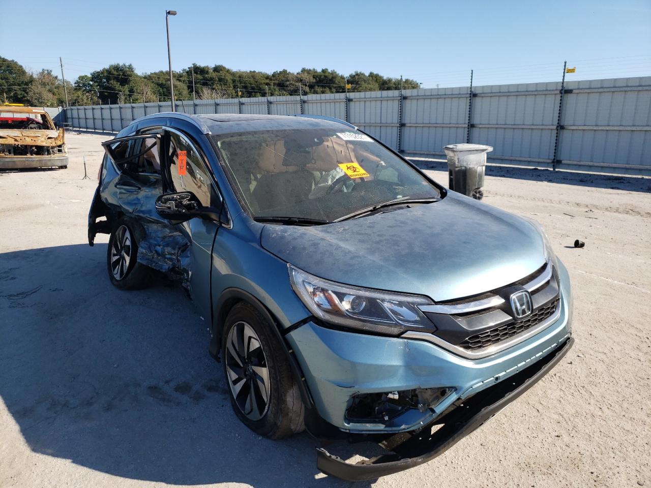 HONDA CR-V TOURI 2015 with VIN 5J6RM3H95FL024179 - Photo from auction