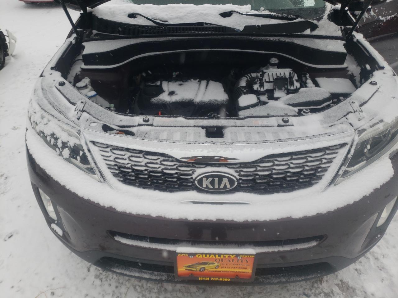 Photo 7 from auction – 2014 KIA SORENTO LX with VIN 5XYKTCA61EG455610