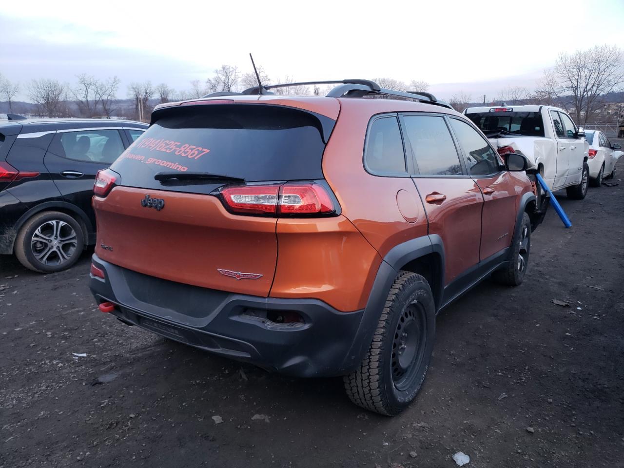 Photo 4 from auction – 2014 JEEP CHEROKEE T with VIN 1C4PJMBS8EW308698