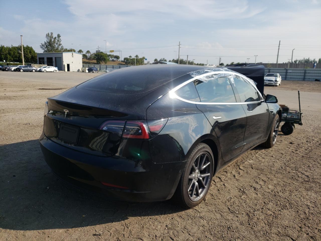 Photo 4 from auction – 2019 TESLA MODEL 3 with VIN 5YJ3E1EA0KF323619