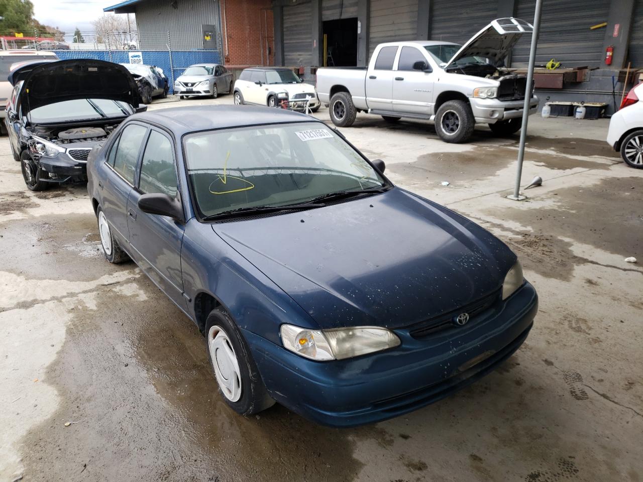 TOYOTA COROLLA VE 2000 with VIN 1NXBR12E9YZ404069 - Photo from auction