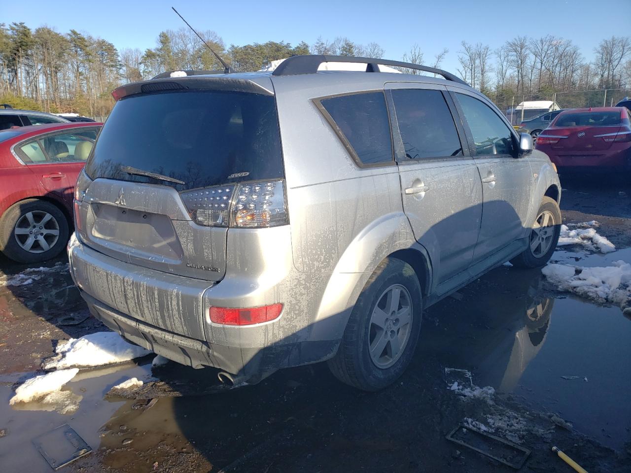 Photo 4 from auction – 2009 MITSUBISHI OUTLANDER with VIN JA4LT21WX9Z011237