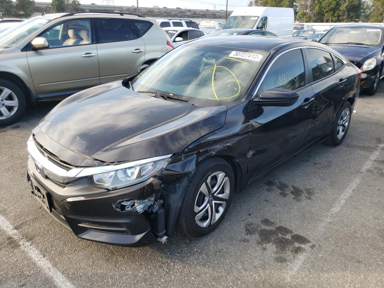 Photo 2 from auction – 2018 HONDA CIVIC LX with VIN 2HGFC2F54JH552941