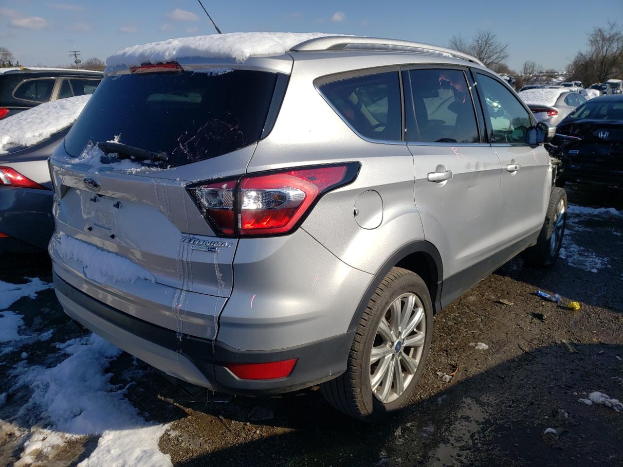 Photo 4 from auction – 2017 FORD ESCAPE TIT with VIN 1FMCU9J95HUD16237